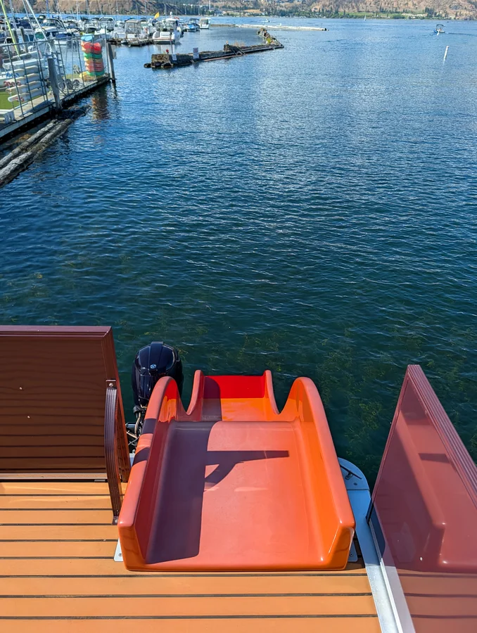 Water slide running from the upper deck down into Okanagan Lake
